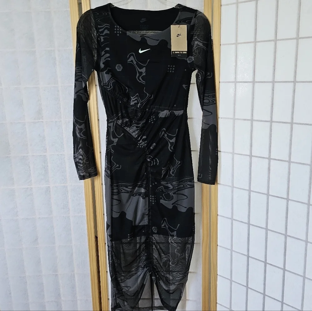 Serena Williams Design Crew crafted this layered mesh midi dress